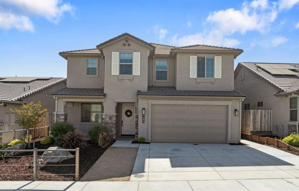 Welcome to this spacious 2,698 sq ft home located in the charming city of Hollister. The Anderson Home property offers 5 bedrooms, including a convenient ground floor bedroom, and 3 full bathrooms, with features like double sinks and an oversized tub in the primary bathroom. The kitchen is L-Shaped with a large island, equipped with a gas cooktop, quartz countertops, and matching appliances including a dishwasher, microwave, and self-cleaning oven. Enjoy meals at the breakfast bar or in the dining area connected to the living room. The living room seamlessly connects with the kitchen with a gas fireplace, creating an inviting space for gatherings. High ceilings and large east facing windows provide ample morning sunlight. The owner's bedroom suite has sitting area with views of the mountain tops. The large owner bathroom has a separate shower stall, tub, dual sink, and large walk-in closet. The home has laminate, tile, and carpet flooring throughout. and central AC for comfort. Laundry room downstairs with space to personalize for your needs. Driveway extension to utilize front yard vehicle potential. Inviting backyard with patio cover, modern cement square patio, and play structure. Located within the Hollister Elementary School District. Solar owner - 5.25KW system.