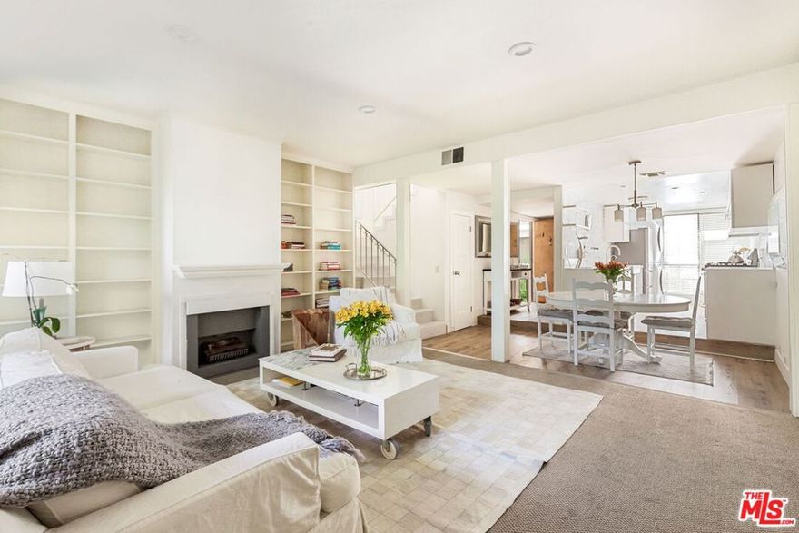 Lovely and spacious 2 bed, 2.5 bath +bonus room townhouse style condo in the heart of Pacific Palisades! Bright and sunny with no neighbors above, this FULLY FURNISHED LEASE boasts a brand new kitchen, new vinyl wood floors and carpet, plantation shutters, a living room with fireplace, front loading washer/dryer inside, and a private rear facing patio with lush green views. Centrally located near schools, shops and the restaurants of the Palisades Village, the building is private and secure, and amenities include a pool, exercise facility, spa, and beautifully landscaped grounds, and offers gated side-by-side parking. All you could want in the Palisades, and  a block to The Village and Palisades Charter Elementary! Minimum one year lease. Please email all showing requests.