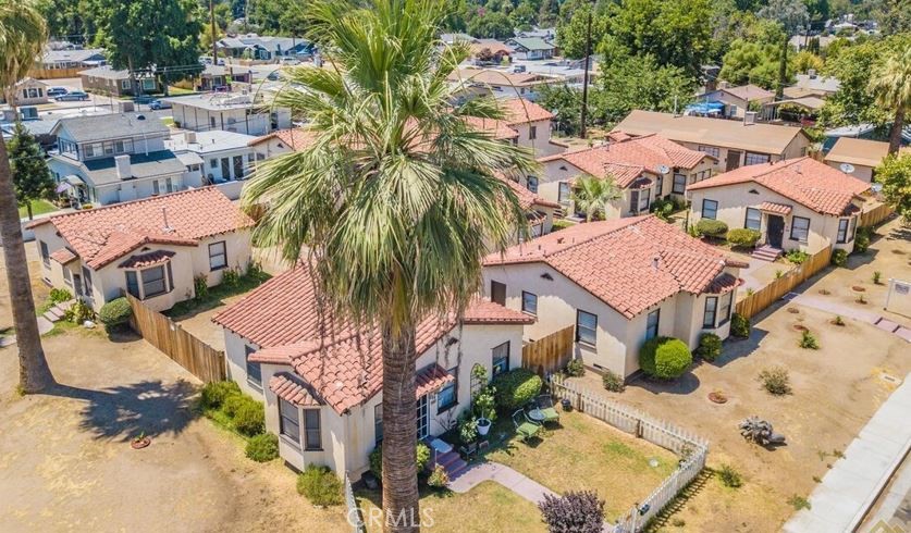 This charming Spanish-style 10-unit apartment
property in Bakersfield presents a rare and beautiful
value-add investment opportunity. The property
features distinctive Spanish cottage architecture with
red-tile roofs, arched entryways, and lush landscaping
that exudes curb appeal and timeless character. Each
unit is thoughtfully designed with spacious layouts and
classic details that attract quality tenants. With strong
in-place cash flow, the investor can enjoy immediate
income from a stabilized rental base in a high-demand
submarket.
What sets this opportunity apart is the significant
upside potential through the conversion of eight
detached garages. The investor has the option to create
new revenue streams by converting the garages into
rentable accessory dwelling units (ADUs), tapping into
the growing demand for affordable housing in
Bakersfield. Alternatively, the garages can be leased as
storage units for additional monthly income. This
flexible value-add strategy offers both immediate and
long-term income growth, making it an ideal opportunity
for a savvy investor looking to capitalize on both yield
and appreciation in a growing Central Valley market.