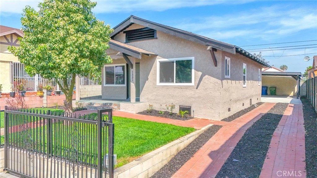 Photo of 1331 W Manchester Ave, Los Angeles, CA 90044 (MLS # DW26064575)