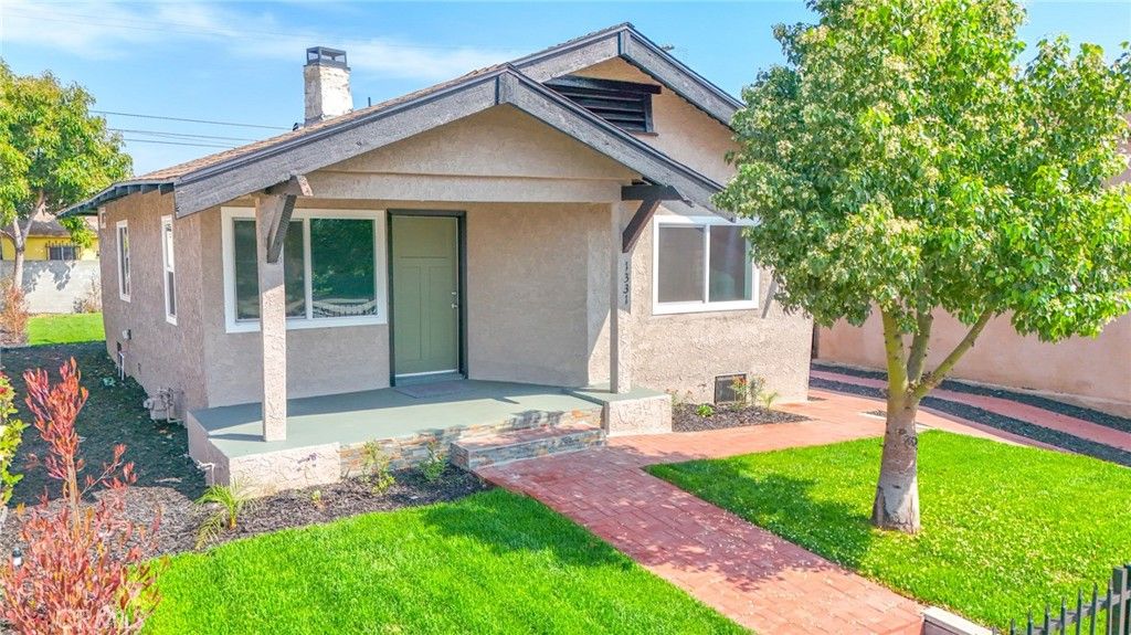 Photo of 1331 W Manchester Ave, Los Angeles, CA 90044 (MLS # DW26064575)