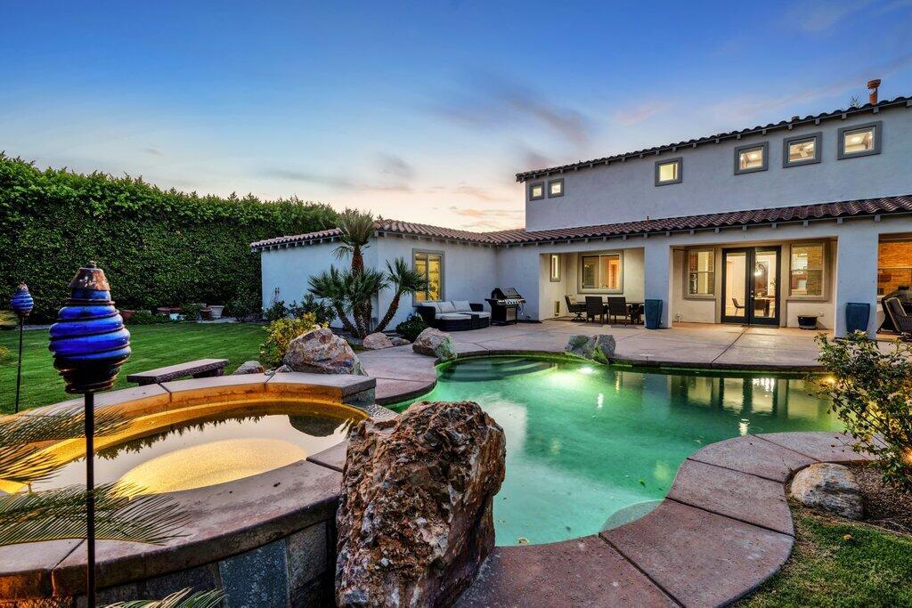 Welcome to this captivating & private south-facing 2-story residence nestled in the gated community of The Orchard. Offered turnkey-furnished, this property offers 3,600+ square feet of luxurious living space featuring 4 large bedrooms, 3 bathrooms, dining room, 2 living areas & an office. As you step inside, you'll find a meticulously designed interior with an abundance of natural light throughout. The gourmet kitchen is complete with sleek stainless appliances, slab granite countertops & island as well as a large walk-in pantry that will delight any cook. The living room fireplace is perfect to cozy up to on cold winter evenings with a cup of cocoa.The primary bathroom is a spa-like retreat, featuring double vanities, a soaking tub for ultimate relaxation & a stand-alone tile shower. The large primary suite has two walk-in closets & French doors leading to a balcony that offers breathtaking views.In the backyard, you'll discover a lush green paradise, complete with fruit trees, mature ficus, a spacious covered patio, a saltwater pool & raised spa that are perfect for unwinding or entertaining guests. You'll understand the magnitude of the 13,000+ sq.ft. sized lot.This home includes a 4-car tandem garage with plenty of storage for the car aficionado and a self-contained storage room. Most major appliances have been replaced within the past 1 1/2 years. Don't miss the opportunity to own this beautifully designed & elegant home that seamlessly combines luxury & comfort.