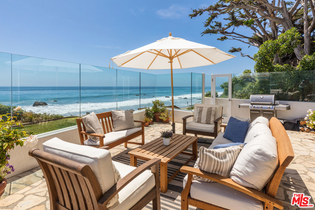 Imagine enjoying an amazing coastline view from your spacious beachfront patio & living areas. Located at the end of a private, gated street this special Architectural home offers an opportunity for complete indoor/outdoor living. Open living area has high ceilings & walls of glass. The dining area looks over the living room & out to the patio; the cooks kitchen has limestone floors & counters.The enchanting master suite, w/fireplace, large walk-in closet, spacious bathroom & separate office area all overlook the ocean. In addition, there are 2 en-suite bedrooms, a large media room, 4th bedroom & bath, game room & a two car garage. A view oriented roof top deck has a bubbling spa, a built-in seating area & the perfect place to enjoy the view at all times of the day & evening. You'll be drawn to the wide sandy beach, where you can wander up the Coast or just sit & enjoy the magnificent sunsets from main living areas, patio & oceanfront master suite. A Very Special & Unique Setting !!