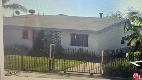 Photo of 1036 W 109th Street, Los Angeles, CA 90044 (MLS # 26671987)