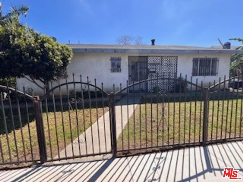 Photo of 1036 W 109th Street, Los Angeles, CA 90044 (MLS # 26671987)