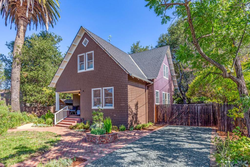 Ideally situated just steps from Stanford University, this classic home boasts gleaming hardwood floors, original millwork, spacious rooms, and a beautiful park-like yard. A welcoming front porch and covered entrance open to a sun-soaked living room with charming built-ins and a reading nook, a generous family room that flows seamlessly to the kitchen and the dining room, and an eat-in kitchen overlooking the spacious backyard. All four bedrooms are housed on the upper level and enjoy abundant closet space and rich hardwood floors. A grove of mature oak trees frames the expansive backyard filled with verdant plantings, lush lawn, meandering pathways, garden beds, multiple fruit trees, and idyllic sitting areas. Fully updated while retaining its historic charm, the home is turn-key ready, yet with ample space for further remodeling and/or expansion. Located in the highly sought-after College Terrace neighborhood and an easy walk from Stanford, local parks, the shops, restaurants, and weekly farmers' market on California Avenue, the Stanford Dish Trail, excellent schools, and major tech employers.