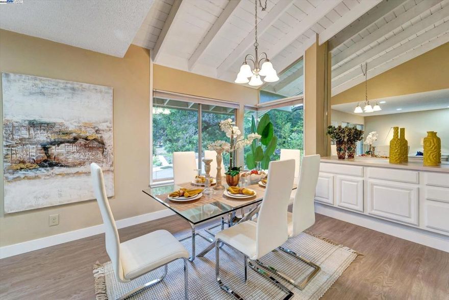 Move-In Ready, Beautifully Updated Condo with Mountain and Creek Views! Nestled in a serene, tree-lined community, this stunning 3-bedroom, 2-bath condominium blends modern comfort, style, and natural beauty. Enjoy breathtaking mountain views from your private balcony and peaceful creek views from all bedrooms. The bright, open-concept living area features brand-new flooring and fresh carpet in every bedroom. The updated kitchen offers sleek white cabinetry, new stainless steel appliances including a gas stove, refrigerator, dishwasher, and garbage disposal—perfect for the home chef. Step outside to your private balcony to relax or entertain while taking in the tranquil mountain backdrop. Additional highlights include a detached 2-car garage and access to a sparkling community pool maintained by the HOA. Ideally located near shopping, dining, and parks, this move-in-ready condo offers the perfect blend of convenience, comfort, and scenic living.