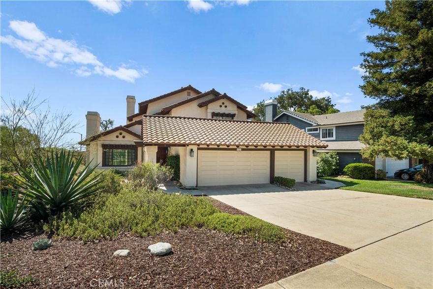 Welcome to this beautifully maintained two-story corner lot home, thoughtfully designed for comfort, style, and everyday living. Offering 4 spacious bedrooms and 3 bathrooms including a highly desirable main-floor bedroom and bathroom. This residence blends convenience with flexibility for multi-generational living or hosting guests. From the moment you step inside, you’ll be greeted by soaring ceilings, abundant natural light, and an open floor plan that creates a warm and inviting flow throughout. The living room, complete with a cozy fireplace and sliding doors, seamlessly connects to the backyard, making it perfect for indoor-outdoor gatherings. A separate family room with its own fireplace offers even more space to relax or entertain. The bright kitchen features a center island, plenty of cabinetry, and a charming eating area with views of the sparkling pool and spa. Adjacent dining and living spaces make hosting friends and family effortless. Upstairs, the expansive primary bedroom offers 2 walk-in closets, a private balcony retreat and a full bathroom with dual sinks, creating a peaceful escape at the end of the day. Step outside to your personal oasis: a beautifully landscaped backyard with a lattice covered patio, grassy play area, and a refreshing pool and spa complete with updated Pentair equipment. Whether it’s summer barbecues or relaxing evenings under the stars, this space is designed for both fun and relaxation. Additional highlights include drought-resistant front landscaping, dual-pane windows, recessed lighting, central A/C, an individual laundry room, and a spacious 3-car garage with built-in storage with direct access to the home. Located near schools, scenic parks, and convenient shopping, this home offers the lifestyle you’ve been searching for in one of Upland’s most desirable neighborhoods. Don’t miss the opportunity to make this stunning home yours.
