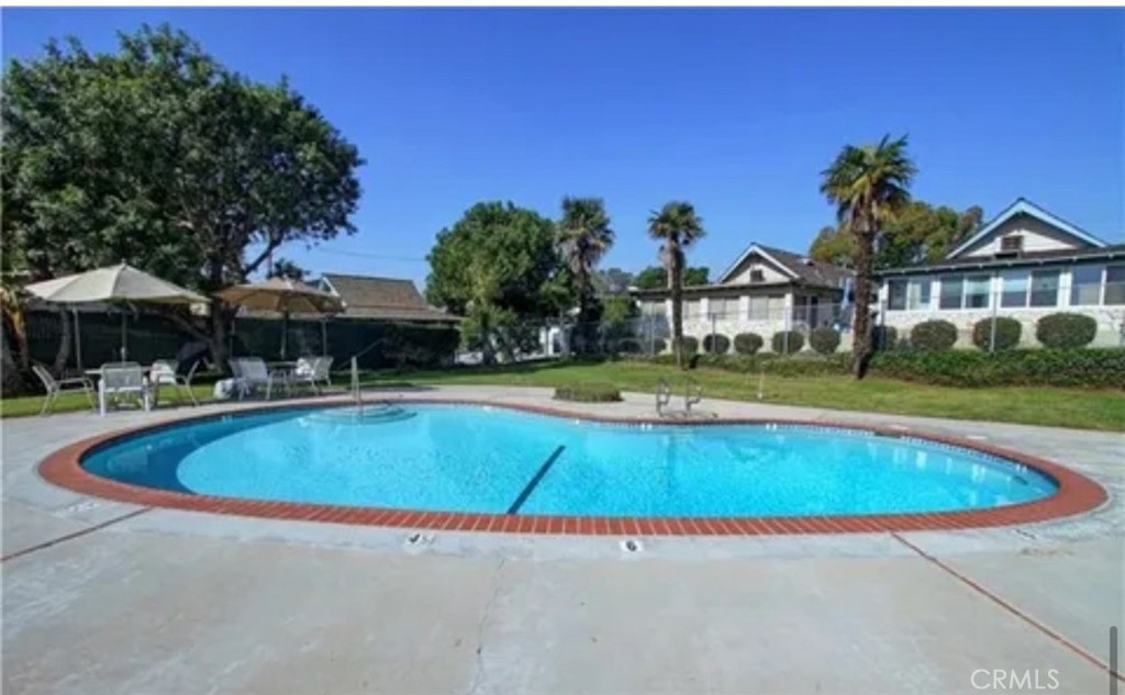Welcome to your next home in the prestigious Bixby neighborhood, one of the most peaceful, safe and scenic communities in the area. This charming property features newly renovated bathrooms and brand-new flooring with a cozy fireplace and a beautiful sparkling pool and a surrounding side recreation area perfect for fun and entertaining.
Enjoy tranquil living in a quiet residential setting, perfect for those who value comfort, security and beauty in their surroundings. Whether you’re relaxing at home or taking a stroll through the tree-lined streets, you'll appreciate the pride of place this neighborhood offers.
Don't miss this opportunity to live in a beautifully updated home in one of the city’s most desirable areas! Front Unit. No Garage.