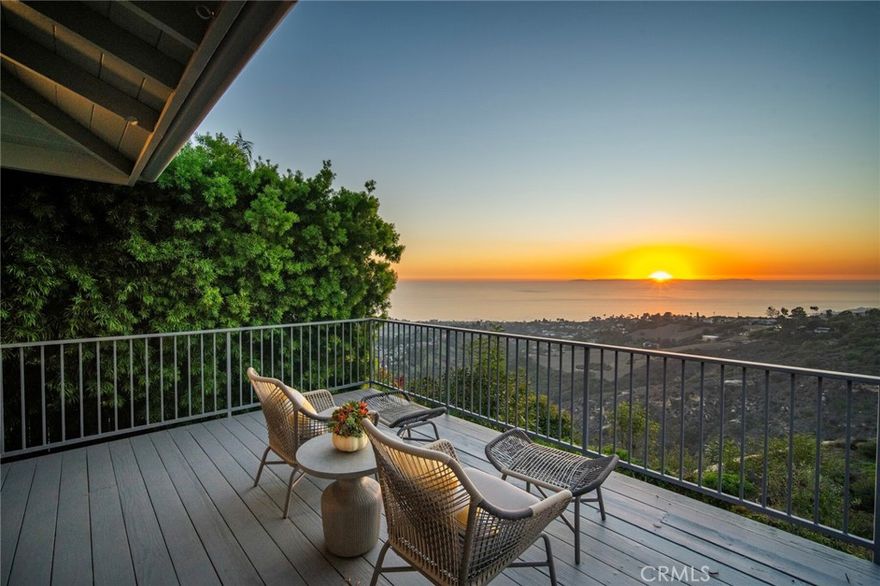Positioned on one of the most sought-after view corridors in Laguna Beach, 2855 Zell Drive captures a front-row perspective that is nothing short of extraordinary. From its commanding elevation, the residence showcases uninterrupted, cinematic vistas spanning Catalina Island, the full sweep of the Pacific Ocean, sparkling evening city lights, Main Beach’s iconic shoreline, and the coastline extending to Palos Verdes. The kind of view typically reserved for postcards is your everyday backdrop and experienced from nearly every room.   

A recent refinement of the property introduced a sophisticated blend of modern comfort and elevated coastal style. The kitchen and family spaces were reimagined with new countertops, beautifully refreshed cabinetry, brass details, designer lighting, and upgraded fixtures, creating a polished environment for both daily living and hosting. A statement limestone fireplace, finished with custom millwork and a slab surround anchors the main living area with understated luxury.

The home’s enhancements extend well beyond aesthetics. Bathrooms were thoughtfully redesigned with new surfaces, hardware, lighting, and tailored details that evoke boutique-hotel appeal. Refinished hardwood flooring, new designer paint across the interior and exterior, upgraded LED lighting throughout, and a curated selection of new fixtures contribute to a cohesive and elevated atmosphere. Modern conveniences such as an EV charging outlet, appliance upgrades, and enhanced exterior safety vents reflect the level of care invested in the residence.

Outdoor spaces were refreshed with new hardscape, landscaping, and thoughtful additions that enhance both curb appeal and livability. Every improvement was made to complement the home’s natural focal point: the sweeping coastal panorama that transitions beautifully from vibrant daytime blues to golden sunsets and shimmering evening lights.

Created for the buyer who values refined living and a world-class view, this home offers a turnkey luxury experience in one of Laguna Beach’s most desirable settings.