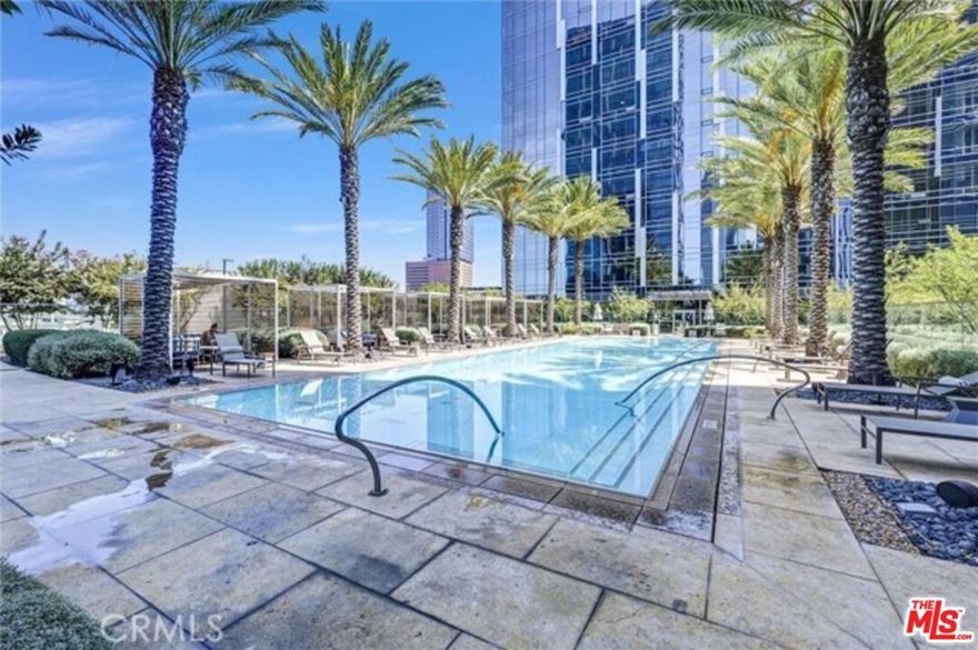 This elegant 1 bedroom, 1 bathroom condo on the 21st floor of Metropolis Tower II in the heart of Downtown Los Angeles features floor-to-ceiling windows with sweeping skyline views, an open-concept layout with sleek European-style kitchen cabinetry, Bosch appliances, wide-plank hardwood flooring, a spacious bedroom with custom closets, and a spa-inspired bathroom, while the building offers an unmatched lifestyle with 24-hour concierge and security, a resort-style pool and cabanas, fully equipped fitness and yoga center, sky park, screening room, business center, pet-friendly amenities, and secured parking all close to LA Live, Crypto.com Arena, Whole Foods, top restaurants, shopping, and major freeway access, making this the ideal home for those seeking luxury, comfort, and convenience in one of LA's most dynamic neighborhoods. ALL UTILITIES ARE INCLUDED EXCEPT  THE INTERNET. Very convenient assigned parking space in B1. Available for showing and move-in starting November 15th.