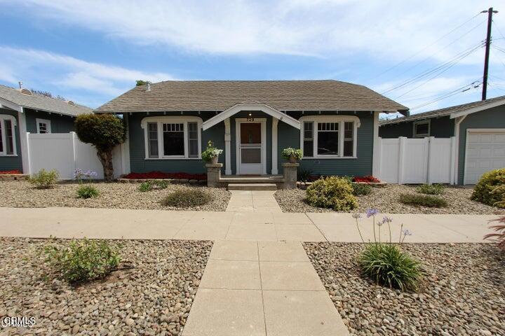 Are you ready to live in a remodeled home with a large backyard, garage, extra parking, a quiet neighborhood then check this out! Nice hardwood floors greet you as you come into a spacious living room. The primary bedroom is quite large with a huge walk in closet. The kitchen has quartz counters and a massive island. Stackable washer and dryer and refrigerator all come with the home. First open house will be on Sunday, August 10 from 12-3pm. Come see!