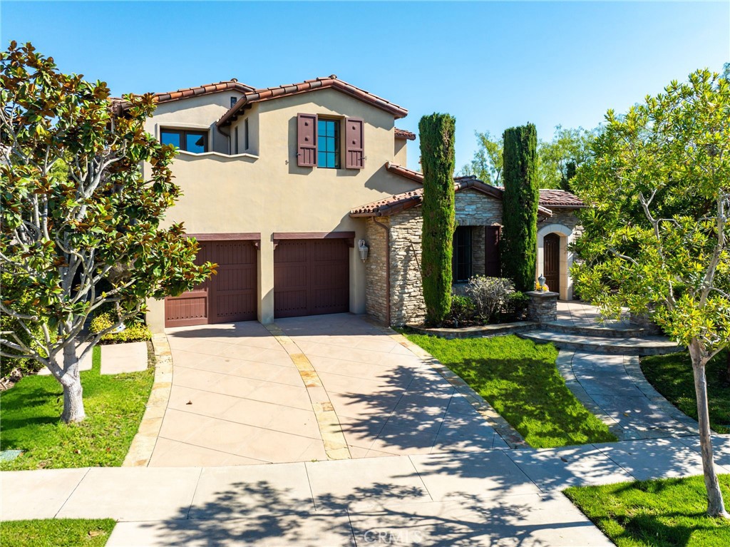 Nestled on a coveted corner lot within the exclusive 24-hour gated community of Pacific Ridge, this exquisite Tuscan-inspired estate embodies a seamless fusion of elegance, comfort, and unparalleled openness. Boasting 5 generously appointed bedrooms and 5.5 newly designed bathrooms, the home offers an exceptional layout, with two bedrooms conveniently located on the main level. One of these, a private-entry casita, serves as an ideal retreat for guests or extended family, ensuring both privacy and convenience. Step inside to discover a world of refined sophistication, where every detail has been meticulously curated for both functionality and indulgence. The second-floor media room presents endless possibilities, whether envisioned as a state-of-the-art home office, an intimate lounge, or a gym. Beyond the main residence, the permitted 600 sqft pool house creates a serene sanctuary for relaxation and outdoor entertainment, adding immense value. Designed for the ultimate entertainer, the expansive backyard is a masterpiece of leisure and recreation. A professional putting green, sand bunker, and ample space for alfresco dining and lively gatherings make this an unrivaled outdoor haven. From the grand entrance to the impeccably landscaped grounds, every facet of this home radiates timeless luxury. Don’t miss the rare opportunity to embrace the pinnacle of coastal living in this extraordinary Newport Coast retreat