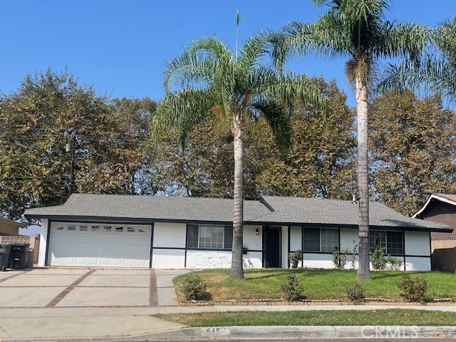 This beautifully renovated home offers a perfect blend of modern style and everyday comfort. Step inside to a spacious living room filled with natural light from large front-facing windows. The open-concept kitchen has been completely remodeled, featuring many cabinetry, sleek finishes, and direct access to garage. It also seamlessly connects to the inviting family room. A contemporary fireplace adds warmth and charm, making the family room the ideal place to relax and entertain. Recently upgraded with luxury water-resistant vinyl flooring throughout. The hallway bathroom boasts dual sinks and a full bathtub. Don't miss the chance to enjoy summer evenings in this move-in-ready gem!