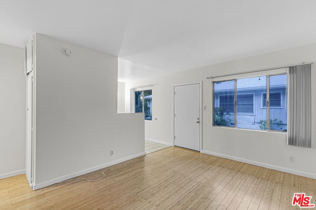 Looking for a place that brings the charm and the convenience? Say hello to your next happy hideaway in the heart of Mar Vista! This one-bedroom lower unit is just steps (literally!) from all the neighborhood goldFatty Mart for your fancy pantry upgrades, Rasselbock for steins and trivia glory, and the Sunday farmers market for the freshest haul in town. Inside, you'll find cheerful white walls, honey-colored hardwood floors, and plenty of natural light to keep the good vibes flowing. The vintage kitchen brings the cute-factor with tiled counters, white cabinetry, and a full-size fridge, stove, and microwave. The bedroom is cozy with great closet space and a peaceful feel, while the bathroom serves up some major throwback magic with retro pink tile that practically begs for bubble baths and funky bath mats. And yes, it's pet-friendly, so bring your best furry buddy. Parking is included (score!), though with everything you love a short walk or bike ride away, your car might feel a little neglected. This one's got personality and location on lock. Come live your best Mar Vista lifequirky charm and all!