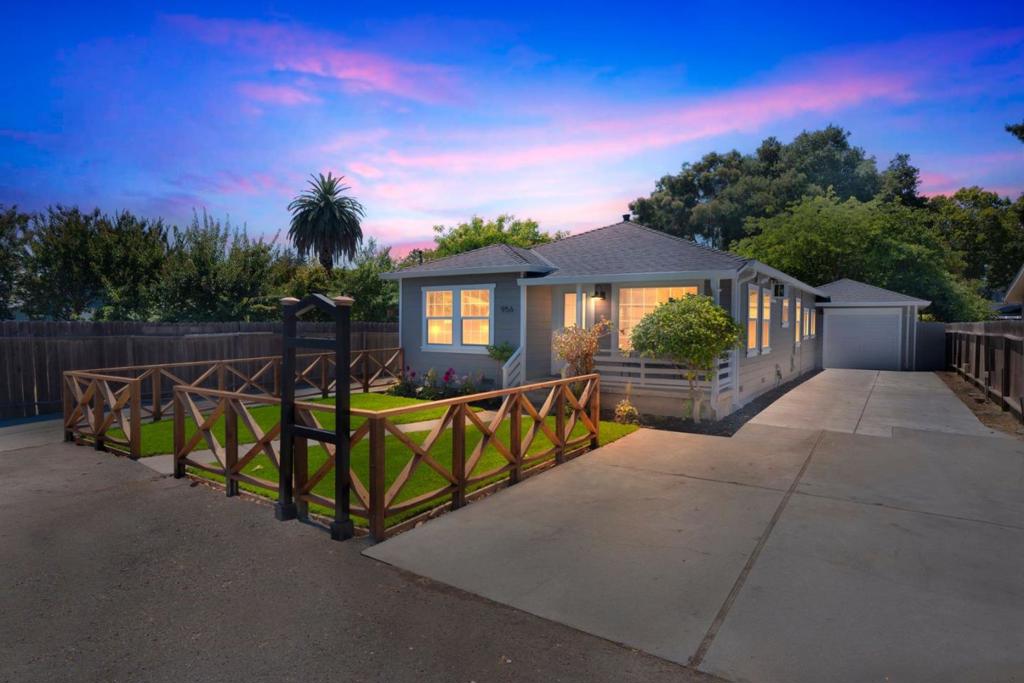 Welcome to 956 Bryant Way, a beautifully renovated 3-bedroom, 2-bathroom home nestled on a spacious 8,700 sqft lot in one of Sunnyvales most desirable neighborhoods. Thoughtfully updated from top to bottom, this home blends modern design with comfort and functionality. Enjoy peace of mind with a new roof, gutters, dual-pane windows, and fresh interior/exterior paint. The front yard offers great curb appeal with fresh landscaping, a new irrigation system, and a new fence. Inside you'll find luxury vinyl plank flooring throughout, stylish new lighting, and a remodeled kitchen featuring new appliances, sleek cabinetry, and elegant finishes. Both bathrooms have been upgraded with new vanities, fixtures, and toilets. Additional highlights include updated plumbing, a new washer and dryer, and more. Step outside to your spacious and peaceful backyard adorned with mature fruit trees and provides the perfect setting for relaxation, entertaining, or even the potential to build an ADU for multigenerational living or rental income. Ideally located near top-rated schools, shopping, dining, and major tech employers including Apple Park, just over 1 mile away this move-in ready home offers rare expansion potential in the heart of Silicon Valley. Don't miss this turnkey opportunity in Sunnyvale!
