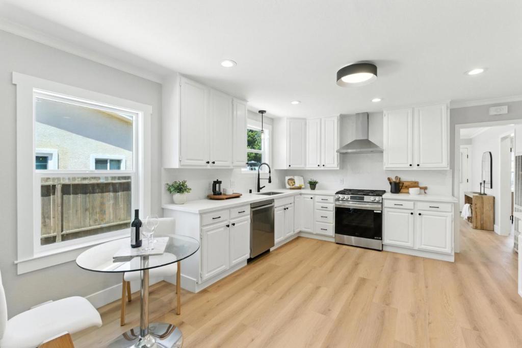 Welcome to 956 Bryant Way, a beautifully renovated 3-bedroom, 2-bathroom home nestled on a spacious 8,700 sqft lot in one of Sunnyvales most desirable neighborhoods. Thoughtfully updated from top to bottom, this home blends modern design with comfort and functionality. Enjoy peace of mind with a new roof, gutters, dual-pane windows, and fresh interior/exterior paint. The front yard offers great curb appeal with fresh landscaping, a new irrigation system, and a new fence. Inside you'll find luxury vinyl plank flooring throughout, stylish new lighting, and a remodeled kitchen featuring new appliances, sleek cabinetry, and elegant finishes. Both bathrooms have been upgraded with new vanities, fixtures, and toilets. Additional highlights include updated plumbing, a new washer and dryer, and more. Step outside to your spacious and peaceful backyard adorned with mature fruit trees and provides the perfect setting for relaxation, entertaining, or even the potential to build an ADU for multigenerational living or rental income. Ideally located near top-rated schools, shopping, dining, and major tech employers including Apple Park, just over 1 mile away this move-in ready home offers rare expansion potential in the heart of Silicon Valley. Don't miss this turnkey opportunity in Sunnyvale!