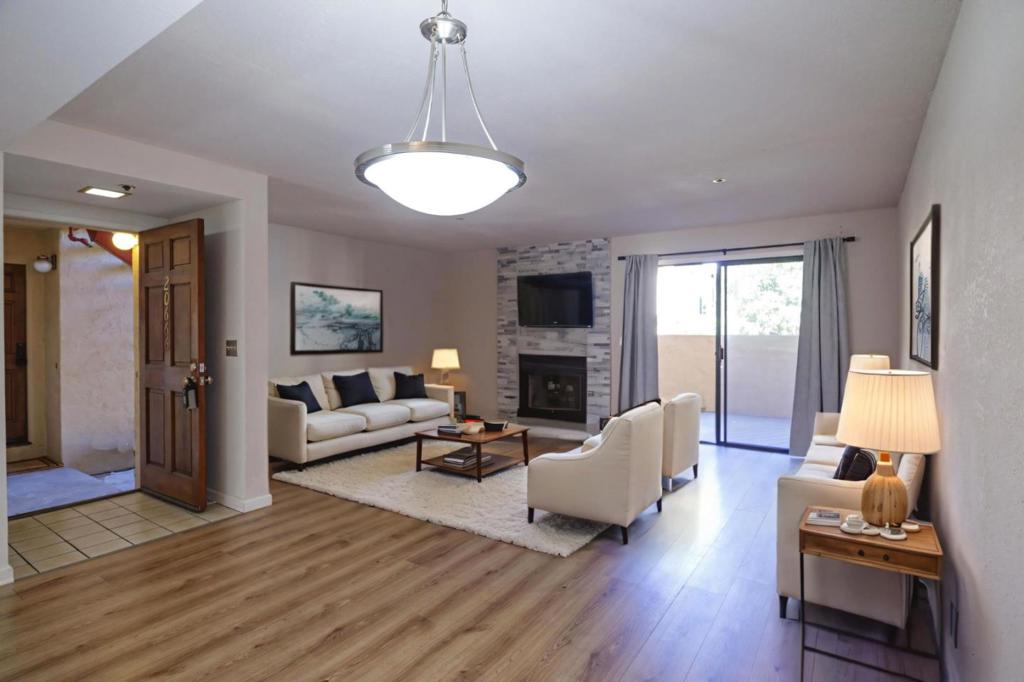 Welcome to this charming 1-bedroom, 1-bathroom condominium located in the vibrant city of Cupertino. 5-minute walk to the Apple Computer campus. Easy bike ride to De Anza Junior College. 1/2 block from the Homestead Square Shopping Center including Starbucks, Safeway & several restaurants. This cozy residence offers 871 square feet of living space. The kitchen is well-equipped with an electric oven range, dishwasher, and tile countertops, perfect for all your culinary needs. The dining area conveniently adjoins the living room, creating an open and inviting space. You will find carpet and vinyl/linoleum flooring throughout the home, providing a blend of comfort and practicality. The living room features a fireplace, adding warmth and ambiance to the space. For added convenience, a washer and dryer are included in the unit. The property also boasts an in-ground community pool, ideal for relaxation and leisure. With 1 garage space and plenty of guest spaces, parking is readily available. Don't miss the opportunity to own this delightful home in the heart of Cupertino. Easy access to Highways 85, 280, 101 and near all amenities.
