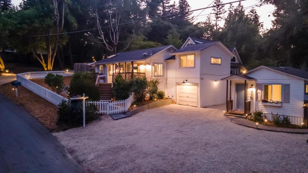 Welcome to the most charming home in Felton! Two turn-key homes in the sought-after Forest Lakes neighborhood. Main home consists of 3 bedrooms, 1 bathroom and has been thoughtfully remodeled throughout. Enjoy the new quartz kitchen complete sit up peninsula. Other features include LVP flooring, recessed lighting, picturesque windows, stunning bathroom remodel, primary bedroom with vaulted ceilings, one car garage and a private fenced backyard. The second unit is a detached studio that has been renovated with a new kitchen complete with granite, new cabinets, LVP flooring, recessed lighting, and a fully remodeled bathroom. New electrical throughout both units (each with their own meter). New drainage installed around the property. Plenty of parking and space for an oversized vehicle. This Felton location does not get any better - only 2 blocks from Hwy 9, walk to Henry Cowell, downtown Felton, Roaring Camp, Forest Lakes, and so much more!