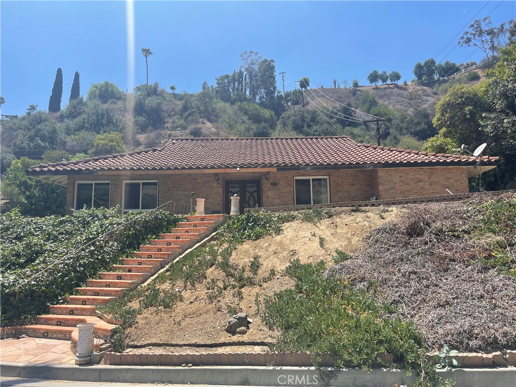 Mar Vista Heights executive home nestled at the base of Whittier Hills. This is the last home at the end of a cul-de-sac. Peace and Serenity abounds. Your neighbor to the north is the beautiful Whittier Hills on this large 1/2 acre lot. The home boast 3 large bedrooms and 2 baths plus an additional den for potential 4th bedroom or Large Home Office. Bring your imagination. There is a grand living room plus a family room off the kitchen. The kitchen has all the modern appliances to make it the central point of your new home. Brand new Central HVAC and Electrical Panel. Comes with refrigerator and newer stove. 2 car attached garage. And no Neighbors behind and to the side. Come and enjoy the peace and tranquility of 7603 Bowen Dr.