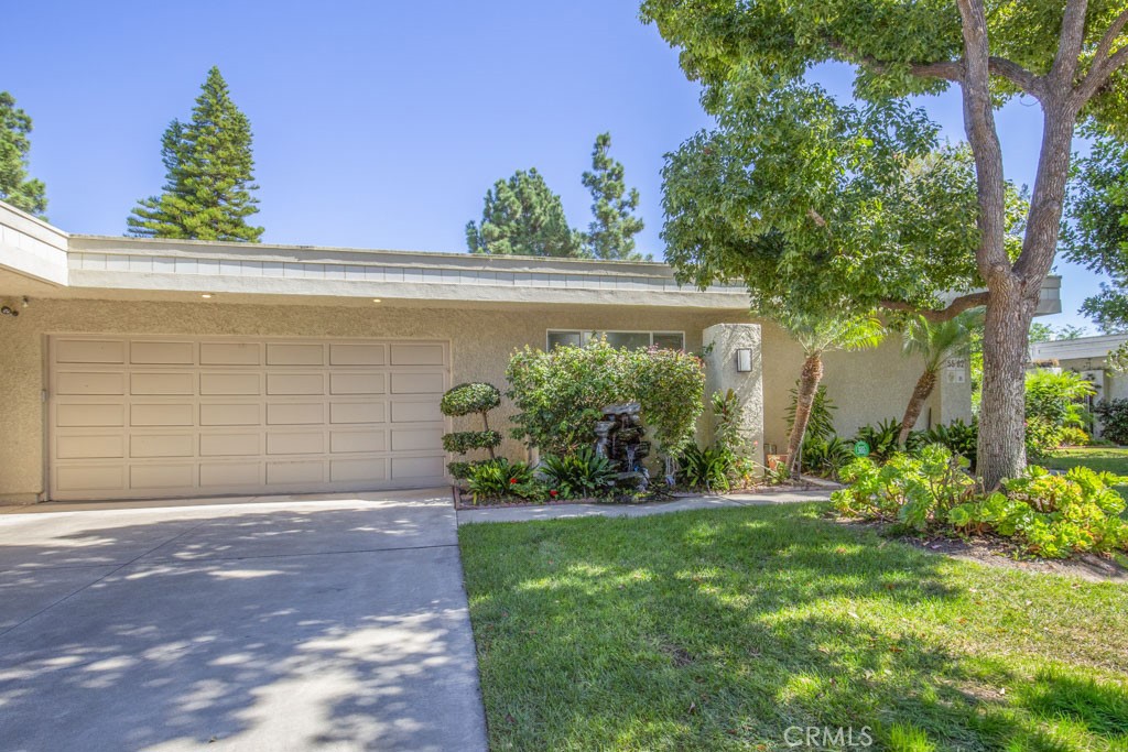 Welcome to 5582-B Via Dicha – a remodeled luxury CASA MONACO residence in the prestigious Grand Finale “110” neighborhood of the Laguna Woods senior community. Nearly 2600 sq ft of living space - largest floorplan in Laguna Woods! Immaculately landscaped w/excellent curb appeal. Lovely private location on a quiet single-loaded street far from busy roads & noisy highways. Impressive double door entry opens to a grand foyer. Spacious living room has dramatic 11’ ceiling & easily accommodates large furnishings. Adjacent dining room readily fits an oversized dining table. Most of the original wall separating kitchen & living room was removed creating a more open living space. Kitchen is chef’s dream w/ample cabinet storage & counter space. Large central island seats up to six. Kitchen features: wine fridge, warming drawer, trash compactor, multiple pots & pans drawers, soft-close cabinet doors & drawers, pull-out drawers & lazy susans. High-end stainless-steel appliances include Bosch oven, gas cooktop & microwave plus Samsung fridge. Large primary bedroom suite is set apart from common rooms allowing for enhanced privacy & has walk-in closet w/custom shelving & luxurious bathroom w/dual sinks & vanity area. Walk-in shower has dual shower heads, seat & convenient accessory shelf. Separate oversized jetted bathtub has extra wide ledge for easy entry/exit. Guest bedrooms have ceiling fans & walk-in closets w/custom shelving. Either guest bedroom could serve as a home office, workout room or arts & crafts studio. Guest bathroom has dual sinks & walk-in shower. Enormous covered rear patio (400 sq. ft.) is accessible from living room, dining room & one guest bedroom & offers tranquil view of immaculately landscaped greenery w/hills, trees & Saddleback Mountains in the distance. Ideal for year-round outdoor entertaining, dining & relaxing. This home has excellent flow & is ideal for large-scale entertaining. Add’l features: smooth ceilings, crown molding, recessed lighting, fans, skylights, dual-pane windows, central HVAC & ceiling speaker system in the living room. Beautiful wood laminate flooring throughout except for the bathrooms with ceramic tile. Separate laundry room w/ample storage cabinets & utility sink. Extended driveway accommodates up to four additional vehicles plus ample street parking for guests. Do not miss this special one-of-a-kind opportunity to own one of the finest homes in Laguna Woods!