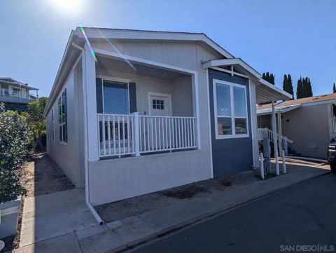 Photo of 4898 1/2 Old Cliffs Rd RD, San Diego, CA 92120 (MLS # 260012995SD)