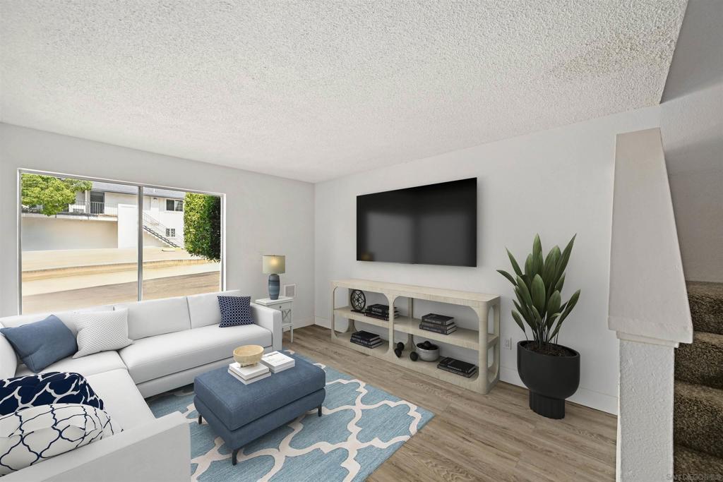 Affordable, stylish, and perfectly located! This upgraded two-story 2BR, 1.5BA townhome offers modern comfort in a central location. The remodeled kitchen showcases custom cabinetry, granite countertops, and stainless steel appliances. A dual-pane sliding door opens to the private rear patio, perfect for relaxing or entertaining. Enjoy luxury vinyl plank flooring throughout, ample storage under the staircase, and updated bathrooms with matching cabinetry and an upgraded shower upstairs. Both bedrooms feature custom closet organizers, plush carpet, and ceiling fans for year-round comfort. The assigned parking space is right in front of the unit for ease of access. Situated in The Grove community with a park right across the street, you’ll be just minutes from freeways, shopping, dining, and the charming Downtown Lemon Grove Village—with convenient access to public transportation. Don't let this opportunity pass you by!