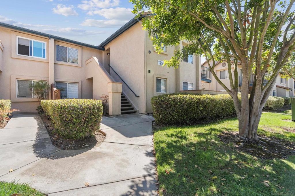 Welcome to this beautifully refreshed end-unit condo in the highly desirable The Falls community of Rancho Bernardo. Perched on the second floor, this bright and airy home offers both privacy and tranquility. Surrounded by lush greenery, the private balcony is the perfect spot to enjoy morning coffee or sunset views. Thoughtfully updated with new paint, LVP flooring, modern lighting, vanities, and more upgrade in recent years, this turnkey residence is move-in ready. The open floor plan features a spacious living and dining area that flows seamlessly into the kitchen. The primary suite includes ample closet space, while the second bedroom is ideal for guests or a home office. Additional highlights include in-unit laundry, extra storage, and assigned parking. Community amenities include two pools, a spa, tennis courts, and a clubhouse. Conveniently located near top-rated Poway schools, shopping, dining, and major freeways, this home offers the perfect blend of style, comfort, and convenience.
