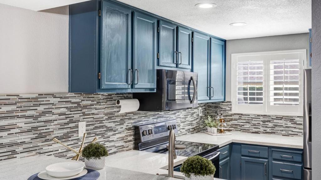 This one is a true gem! This turnkey beauty is situated on the ground floor within a peaceful gated community. The spacious living room features a cozy fireplace and a large glass slider that opens up to your very own private patio, where you can enjoy views of a tranquil waterfall and serene surroundings. The kitchen is well-equipped for all your culinary adventures, and the generously sized bedroom boasts a large closet for plenty of storage. The bathroom is fitted with a stylish stall shower that perfectly complements the home. This move-in-ready residence is part of a beautifully landscaped community offering fantastic amenities, including a pool, tennis courts, and walking paths. The HOA covers exterior maintenance, garbage collection, roof upkeep, and in-unit water, gas, and cable, leaving you responsible only for electricity and internet. The unit also includes connections for a washer and dryer. Conveniently located near highways 101, 880, and 87, as well as shopping, dining, and parks, this condo is truly a must-see!