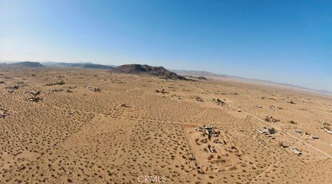 Photo of 59520 Reche Road, Landers, CA 92285 (MLS # JT25118020) Photo of 59520 Reche Road, Landers, CA 92285 (MLS # JT25118020)
