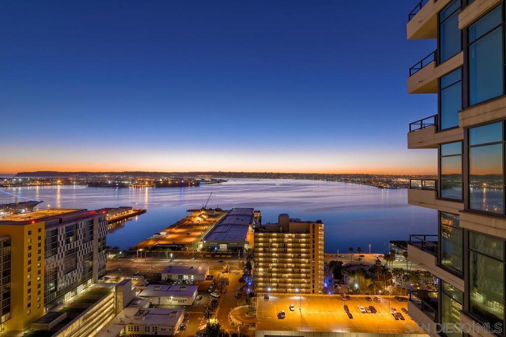 The Grande North 2506 is a large 2br+den/2ba condo high up on the 25th floor. It has incredible views of the Coronado, Pt Loma, the bay and downtown's skyline. There is a walk-in closet in the primary bedroom, separate shower and tub in the primary bathroom and a large balcony off the living room. The kitchen is well appointed with high-end SS appliances and granite counter tops and there are Brazilian cherry wood floors. The building has 24hr security, concierge service, a guest suite and more. The Grande also offers a renovated community room, steam and sauna, gym, pool, spa and BBQ area. The building is located right around the corner from Little Italy and the farmers market and across the street from the bay.