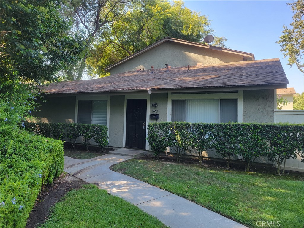 Welcome to this beautiful home in the sought-after Galstar Wood community of West Covina. The location of this unit is private with tranquil, nature surrounding it. The living room is large and airy and it flows effortlessly into a dining area that's perfect for sharing meals or entertaining. The kitchen is clean and seamless with appliances including refrigerator and stove. At the rear of the kitchen, the in-unit laundry setup is both convenient and discreet. Both bedrooms are well-proportioned, each offering generous closet space and plenty of natural light. The bathroom is centrally located, creating an easy and functional layout for everyday living. The home has a small, fenced and private patio are that is a blank slate and can be transformed into a peaceful oasis. The gated Galstar Wood complex offers a lot of amenities including a pool, clubhouse, and playground ideal for enjoying sunny California days. The unit also includes a single carport with additional storage, and central heating and air conditioning ensure year-round comfort. This community has a great location, close to the freeway, shopping restaurants and Galstar Wilderness Park.