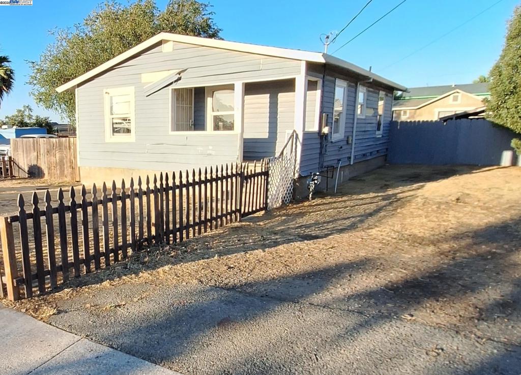 Step into this 2-bedroom, 1-bathroom home set on a generous 7,303 sq.ft lot. With a solid structure, dual-pane windows, and a practical floor plan, this home is livable as-is and primed for some TLC upgrades. The kitchen and flooring are ready for a refresh, giving you the perfect canvas to make it your own while gaining some "sweat equity". The spacious side yard and backyard offers room to grow, add an ADU, create an outdoor lounge area, or simply enjoy the extra space. On-site parking can easily accommodate your RV, boat, or multiple vehicles. Situated just minutes from BART, shopping centers, and convenient freeway access (Hwy 4 & 680), this home combines location, lifestyle, and long-term potential. With a bit of effort, this semi-fixer could be your ideal first home and a smart investment.