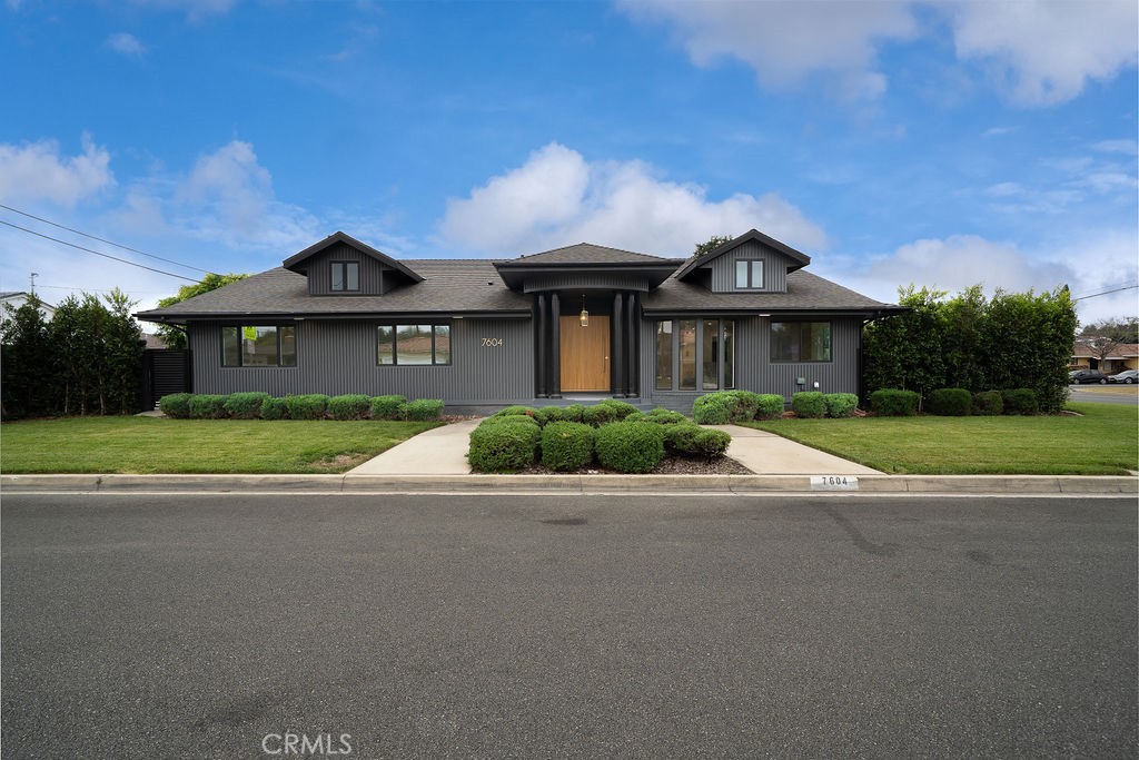 Luxury isn’t just a feature, it’s a lifestyle. Perfectly placed on a coveted corner lot in the heart of Downey’s prestigious Orange Estates, this completely remodeled 3-bedroom, 3.5-bathroom showpiece has 2,470 sq. ft. of living space and sits on an expansive 8,363 sq. ft. lot, blending high-end craftsmanship with timeless design. From the moment you arrive, the curb appeal is undeniable. Custom siding, smooth stucco, new windows, and a striking pivot entry door create an elegant welcome, hinting at the beauty within. Step inside to an open floor plan bathed in natural light, with gleaming hardwood floors, recessed lighting, and soaring 7-foot doors throughout. The gourmet kitchen is the centerpiece, with white oak cabinetry, Bardiglio marble countertops, and premium ZLINE appliances. Just steps away, the dining area invites you to imagine lively dinner parties and intimate gatherings that stretch late into the night. Both the living room and family room open to the backyard through sliding doors, seamlessly connecting indoor and outdoor spaces. Sunlight pours in year-round, enhancing the warmth of the home. At the heart of it all, a breathtaking double-sided fireplace, covered in marble from floor to ceiling. Outside, your private oasis awaits - a sparkling pool framed by Ficus trees for privacy, with olive trees and a lemon tree. The master suite is a true retreat, complete with a spa-like bathroom, abundant closet space, and direct access to the backyard. Each of the three spacious bedrooms boasts its own luxurious bathroom, appointed with white oak cabinets, marble finishes, and walk-in showers, plus there’s a stylish half bath for guests. Additional highlights include a dedicated laundry room, a two-car garage with a small workshop, and a generous driveway for extra parking. This highly desirable location means quick access to Rio Hondo Elementary, Furman Park, Rio Hondo Golf Club, local shopping, dining, and the 5, 605, 105, & 710 freeways.