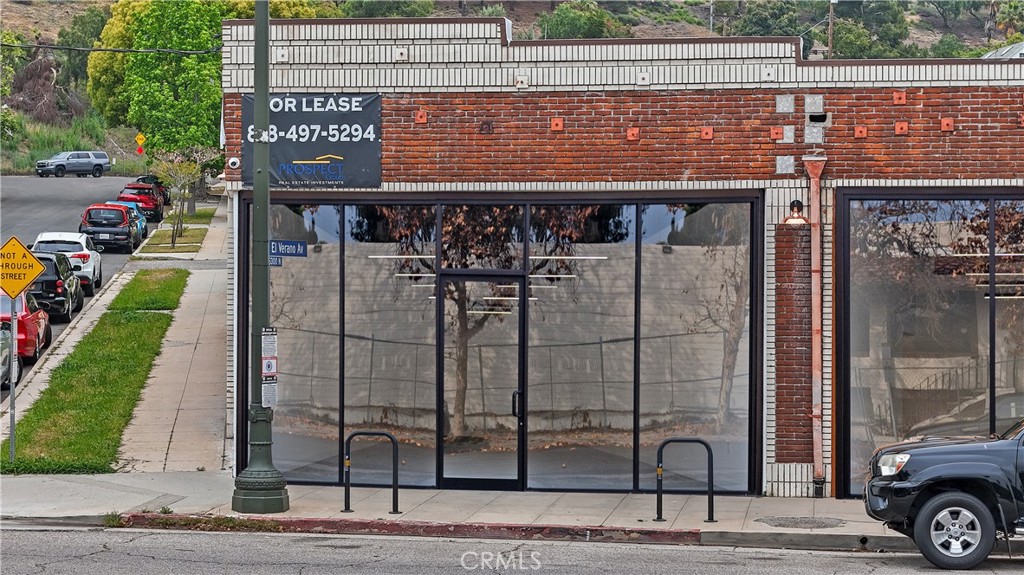 This charming, single-story brick building offers a distinctive commercial space with high ceilings and an abundance of natural light from its south-facing orientation. The recently renovated unit features spacious bathrooms, ample storage, and a modern HVAC system for year-round comfort. Polished concrete floors lend a sleek, contemporary aesthetic, while reserved parking and plentiful street parking provide easy access for both clients and employees. Permitted Uses Include: Retail stores and shops, restaurants, and cafes, office spaces (professional, medical), and galleries etc...