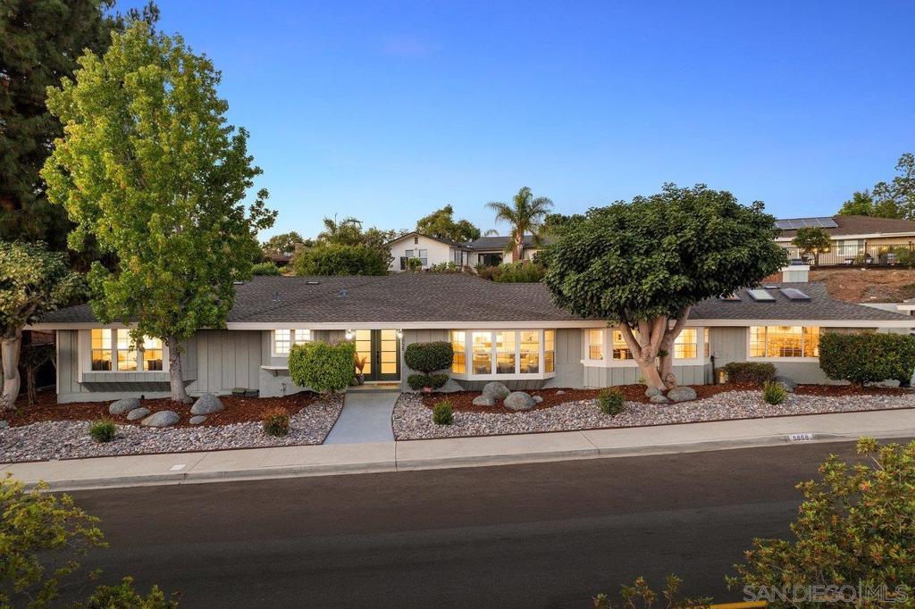 Gorgeously remodeled single-level home with open floorplan, gourmet kitchen, spa-like primary suite, and oversized bedrooms with bay windows. Enormous ADU with fireplace, kitchenette, and private bedroom. Large yard with pergola, gas fire pit, and play/entertainment space — all in a prime Del Cerro location near Hearst Elementary, freeways, and shops. See Supplement for details. Single-level masterpiece has been gorgeously remodeled, offering 4 bedrooms and 3 baths in the main home. The primary suite is truly a retreat, featuring a walk-in closet and a spa-like shower that feels like a five-star resort. The open floorplan flows seamlessly into a gourmet kitchen with a gas range and an oversized pantry—ideal for everyday living and entertaining alike. The auxiliary bedrooms are generously sized, each enhanced by charming bay windows that flood the rooms with natural light. But the surprises don’t stop there. Enormous ADU adds tremendous value, complete with a spacious living area, cozy fireplace, kitchenette, dining space, and a separate bedroom—perfect for extended family, guests, or rental income. Step outside to a large yard designed for gatherings and play, featuring a pergola, gas fire pit, and plenty of room to create memories. All of this is set in a prime Del Cerro location, within walking distance to Hearst Elementary, close to freeways, shopping, and more