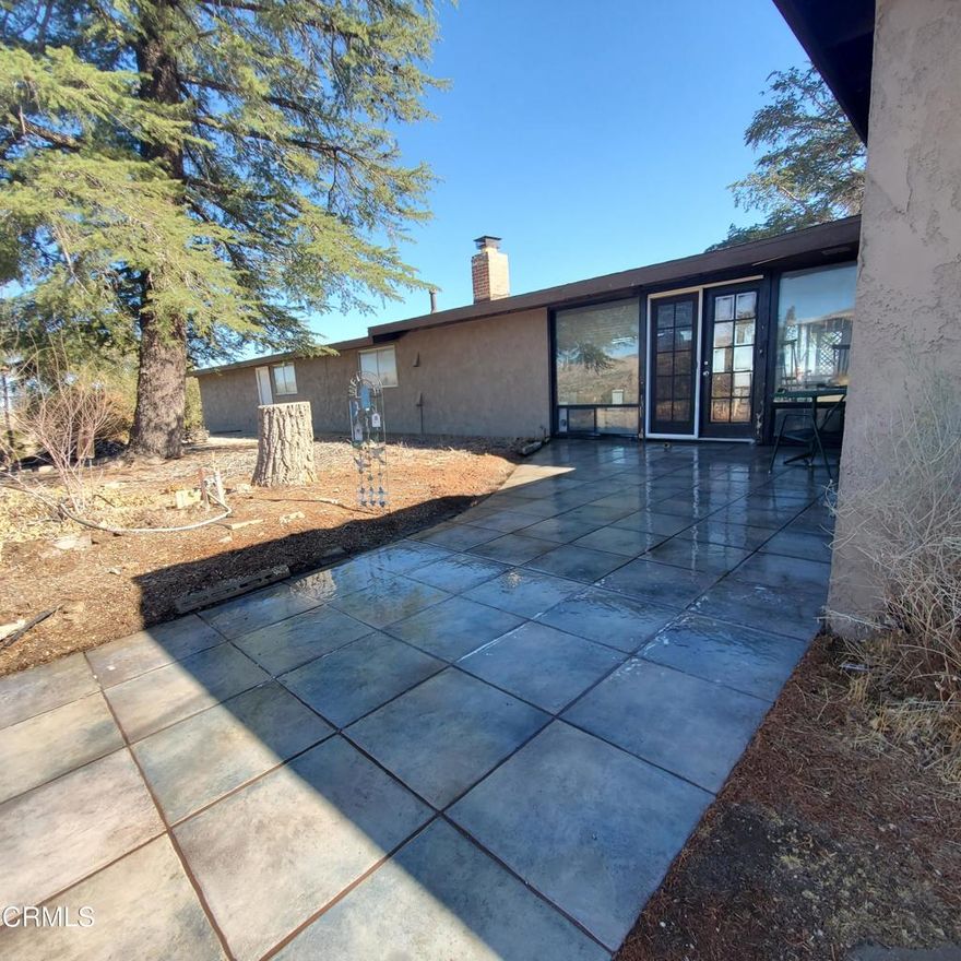 This 3.4 acre property is situated on a high point along 121st Street, adjacent to the California Aqueduct and has panoramic views of the Antelope Valley looking north, and the San Gabriel Mountains looking to the south.  This contemporary home has 4 bedrooms and 2 baths and a large bonus room.  The home has an open concept kitchen/dining room with floor to ceiling windows that continue into the living room. This home is priced to sell.  It needs work - there is deferred maintenance and it's being sold AS-IS.