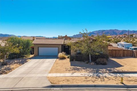 Photo of 74103 Manana Drive, 29 Palms, CA 92277 (MLS # JT25255835)