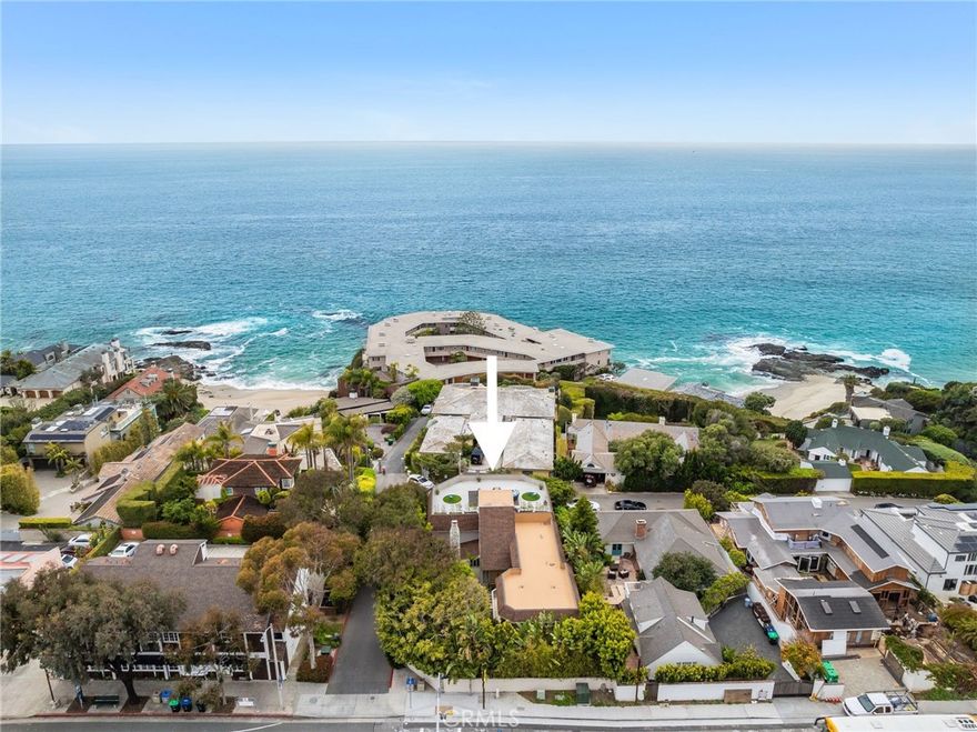 Located just one mile south of the renowned Montage Resort, 31588 Table Rock Drive offers an extremely rare and exceptional value on the ocean side of Coast Highway — boasting the lowest price per square foot for an active listing in this coveted area.  This classic architectural home with approximately 4,100 square feet of living space is situated on a large, lush corner lot with convenient access to beautiful Secret Cove beach. Add in phenomenal coastline views as well as close-in whitewater views and a rare, immense rooftop patio terrace with vast, unobstructed 360-degree views. The oversized “living/great room” with high ceilings offers captivating 180-degree wrap-around ocean view, sitting and entertaining areas. The home's ocean view kitchen with its extensive countertop is designed for cooking and entertaining. This residence offers five bedrooms and four upgraded baths…along with inspiring and large private work-at-home studio offices. The generous primary bedroom suite offers an ocean view…as well as an additional ocean view terrace. An inviting family room centers on its distinctive rock fireplace, which pays homage to its Table Rock location. This home is situated on an exceptionally large lot and offers wonderful privacy and abundant outdoor living with beautiful private rear and side yards. The epitome of Laguna Beach living, steps to Table Rock and West Street beaches, and at low tide, easy access along the sand to the world-renowned Montage Resort. Please schedule your private tour to see this spectacular home at this amazing price.