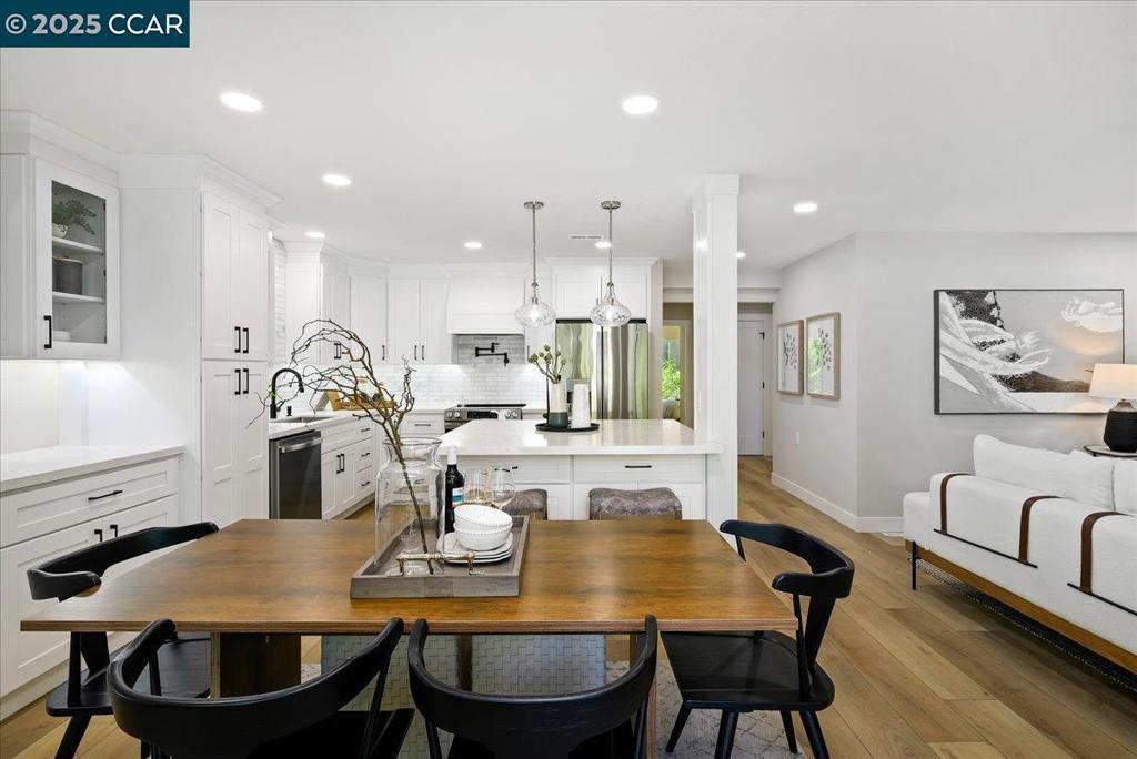 This thoughtfully renovated Sonoma floor plan offers open-concept living with luxury vinyl floors, an electric fireplace, and dual-pane windows. The chef’s kitchen features a spacious island, GE Profile appliances, and marble backsplash—perfect for entertaining. The primary bath includes a wide dual-sink vanity and a spacious marble shower. A full-sized washer/dryer combo adds everyday convenience. Ideally located just across from the Hillside Clubhouse in Rossmoor’s award-winning gated community.