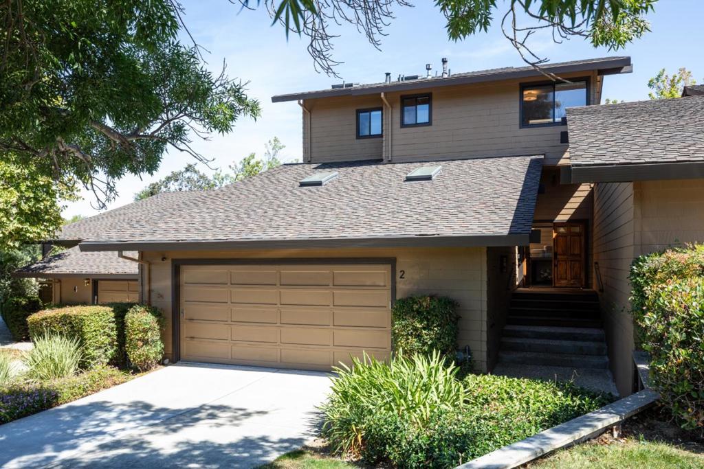 Welcome to a residence that epitomizes refined living, where timeless style and modern comfort come together in the coveted Sharon Hills community. A dramatic double-door entry opens to soaring ceilings, luminous interiors, and custom-crafted finishes that create an atmosphere of sophistication and ease. The thoughtfully remodeled kitchen, expansive living and dining areas, and seamless indoor-outdoor flow set the stage for both relaxed daily living and effortless entertaining. The primary suite is a true retreat, featuring vaulted ceilings, a private balcony, a spa-inspired bath, and a fireplace that adds warmth and elegance. Beyond the interiors, a serene patio invites year-round enjoyment, while community amenities such as a pool and tennis court further enrich the lifestyle. With its excellent location near shopping, recreation, and top-rated schools, this home offers an exceptional blend of elegance, comfort, and convenience.