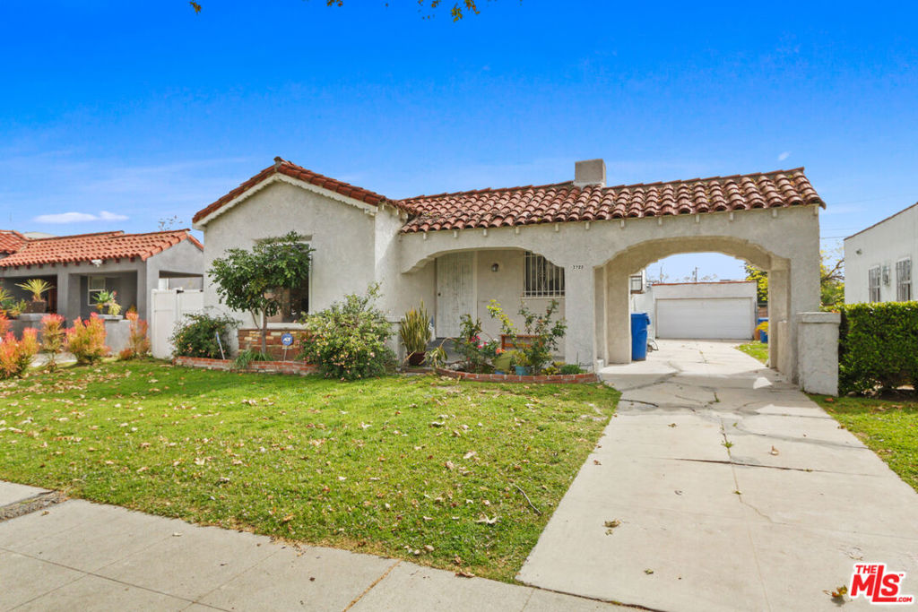 Have a Southern California summer year-round in this lovely Spanish home with a pool available now! Centrally located on a quiet, tree-lined street, this 2-bedroom, 1.5-bath property offers a living room with a fireplace, a formal dining room, a breakfast nook, a service porch, and spacious bedrooms. It also provides several appliances, including a range/oven, dishwasher, refrigerator, and washer/dryer. You will also find tons of natural light, updated flooring and paint, and ample storage, including garage access. The exterior offers a large pool perfect for warm, sunny days with friends and family. Located in the coveted pocket of Crenshaw Manor, this home has easy access to the 10 freeway, the Expo train line, restaurants, and shops of Leimert Park Village and West Adams, and USC! Have the California summer you've always dreamed of all year - don't miss this one!