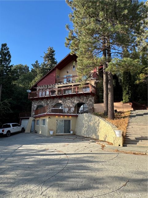 Photo of 27914 West Shore Rd, Lake Arrowhead, CA 92352 (MLS # IV25209115)