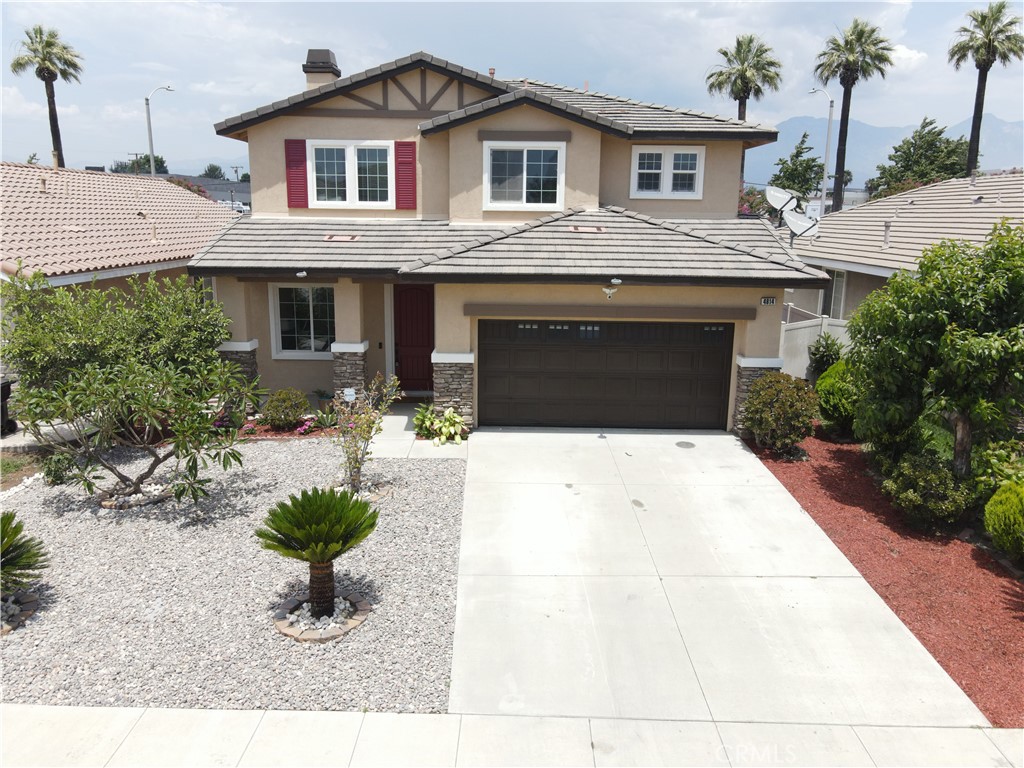 Huge Price Dropped! Seller is very motivated to sell. Newly remodeled, Newly painted exterior & interior, Move-in-ready 3 bedrooms, bonus loft, 2 1/2 bathroom in desirable and quiet neighborhood. Charming front porch entry. Step into elegant living and dining areas with attractive tile flooring and an abundance of natural light. Spacious family room boasts fireplace, tile flooring and opens to the kitchen. Gourmet kitchen enjoys granite counters, recessed lighting, pantry & kitchen island that leads to the back yard. Powder room and laundry room downstairs. Newly installed vinyl plank flooring on the stairs and through out second floor. The master bedroom features recessed lighting, walk-in closet, and on-suite bathroom with oval soaking tub and separate walk in shower. Generously sized secondary bedrooms all with recessed lighting, mirrored closet doors. Landscaped with decomposed low maintenance materials. Close to schools, shopping and freeways.
