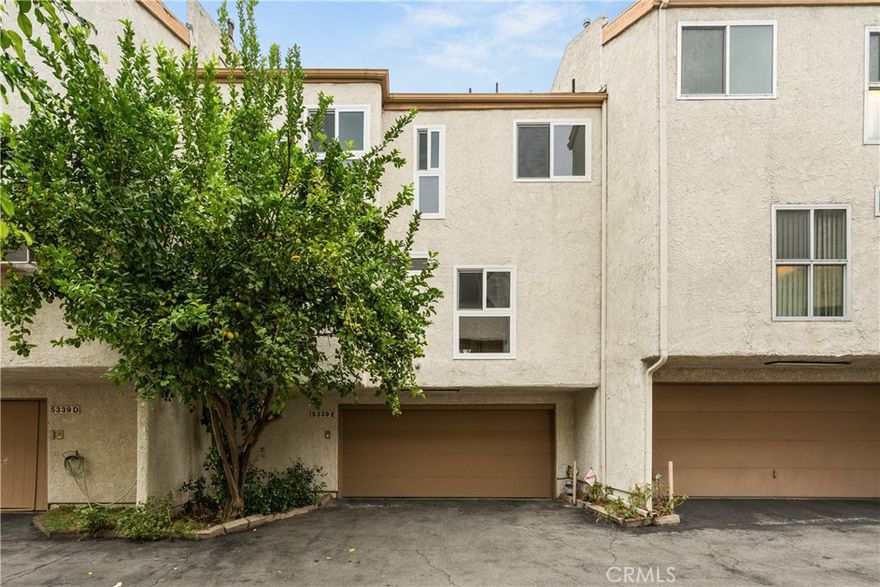 Welcome to this beautifully updated townhome with a two-car attached garage in Coldwater Villas, a charming community located in a quiet Sherman Oaks neighborhood. Inside, the open-concept main level features a spacious living room with access to a large patio, remodeled kitchen with stainless steel appliances, bedroom and full bathroom. Upstairs, there are two generously sized ensuite bedrooms, including an impressive primary suite that boasts soaring ceilings, a private balcony, walk-in closet and spa-inspired bathroom, complete with a soaking tub, oversized shower and double vanity. Additional highlights include an oversized two-car garage with laundry and resort-like grounds, complete with a community pool/spa, sauna, rec room and lush landscaping. Located in an excellent school district and nearby shops, restaurants and public transit.