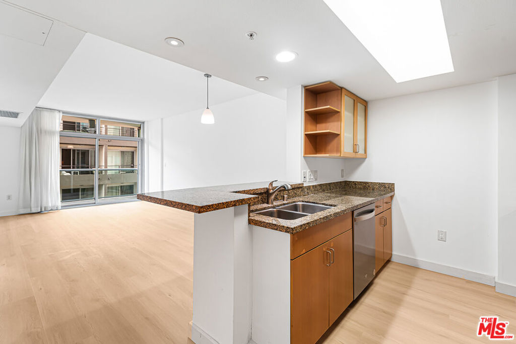 Gorgeous 1 bedroom, 1 bathroom condo in the full-service Azzurra. This bright and spacious unit offers brand new luxury vinyl floors throughout, a great open floorplan, large balcony, stainless steel appliances, granite counter-tops, walk-in closet, 9 feet of floor to ceiling glass, 2 car parking, washer/dryer in-unit, central air and heat, and much more! HOA fees include cable, internet, water, trash, earthquake insurance & an abundance of amenities - 24 hour valet for guests, 24 hour front desk and security, rooftop spa and lounge, heated pool and spa with cabanas, media lounge, art collection, indoor/outdoor gyms with a yoga/pilates studio, and more! Minutes to world famous beaches, trendy shops/restaurants, LAX, bike path, dog walks, theaters and more!