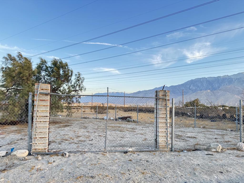 Nice piece of land with a size of 5227.2 sqft is awaiting for you! This lot it's a triangle shape where the larger part of the triangle is on Dillon Road, a few blocks away from N Indian Canyon, Palm Springs. Buyer win with this lot features! It has water meter, gas pipes, electric pole, and an old water well. On W-2 zone, you can build a house, a garage, a manufactured home, small commercial building, or a combination of structures, depending on local zoning ordinances and building codes in the county. Highest and best use is combine this lot with lot 9 next door making .35 acres=15,246 sqft. Let's move forward and bring an offer, start a new journey on this lot with lots of potential to grow! Enjoy the beautiful mountains view, and nice sunset.
