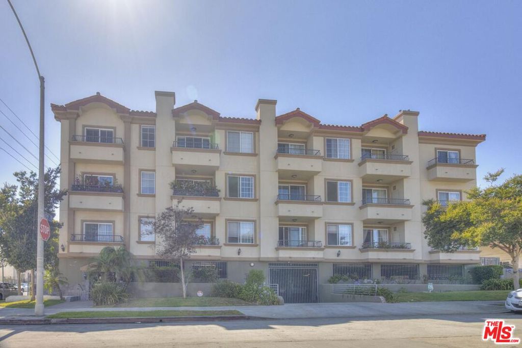 Welcome to this stunning turn-key condominium, built in 2007, perfectly situated near some of the most vibrant neighborhoods in Los Angeles. Experience the convenience of being just moments away from Larchmont Village, Melrose, Fairfax, Brea, Koreatown, and Hollywood, with easy access to the 101 Hollywood Freeway. Step inside the open-concept unit and be greeted by a modern kitchen equipped with top-of-the-line stainless steel appliances, recessed lighting, luxurious granite countertops, and an abundance of cabinetry. The breakfast counter provides a delightful spot for enjoying a quick bite or your morning coffee.Designed with entertaining in mind, the spacious dining area is thoughtfully positioned across from the kitchen, creating a seamless flow. The living room, with its bright and airy high ceilings, opens up to a comfortable balcony where you can relish in the refreshing summer breeze. The en-suite master bedroom is a true retreat, featuring a generously sized master bathroom complete with double sinks, a separate shower, and a spacious bathtub the epitome of relaxation. The second bedroom is equally spacious, making it an ideal guest suite or versatile space. Both bedrooms are strategically placed apart from each other, ensuring utmost privacy. Included with this unit are two conveniently located assigned parking spaces, Side by Side, providing ease and convenience. Modern comforts abound, including central air/heat, a security entrance for your peace of mind, and the convenience of an in-unit washer and dryer. As a resident, you'll have access to the community gym, enhancing your active lifestyle. Positioned at the front of the building, this unit enjoys abundant natural light.