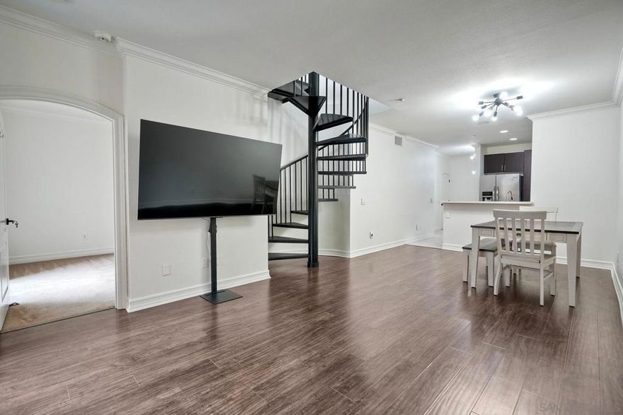 Discover urban living at its finest in this stunning top-floor 2-bed / 2 bath UNFURNISHED condo at Park Blvd East, offering 1,077 sq ft of light-filled space in the heart of East Village. Features include a modern kitchen with quartz countertops and a mini subway tile backsplash, updated bathrooms, sleek new finishes throughout, and a rare private rooftop deck — perfect for entertaining. The unit comes with two side-by-side parking spaces, a storage locker, and in-unit laundry.   At Park Blvd East, enjoy building amenities such as a landscaped courtyard, on-site spa area, secure entry, underground parking, and bike storage — all within steps of restaurants, cultural spots, and downtown attractions.   Live where city life meets comfort — this penthouse condo is a rare gem in San Diego's dynamic East Village.