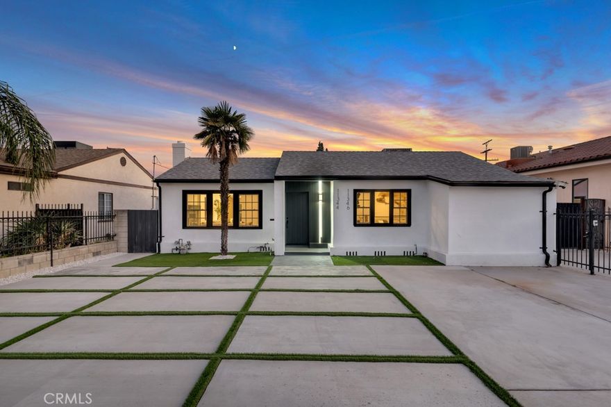 Introducing this beautifully upgraded single-family home in North Hollywood! Spanning 1,650 square feet, this charming residence features 3 bedrooms and 2 bathrooms. Upon entering, you'll be captivated by the exquisite details, including stylish light fixtures, textured walls, and stunning marble countertops. The entire home boasts elegant engineered wood flooring and recessed lighting, creating a warm, inviting ambiance.



Step into the cozy living room, complete with a sophisticated fireplace that adds character to the space. The first bathroom, conveniently located in the hallway, showcases a modern design with a floating vanity and a skylight that fills the room with natural light. The primary bedroom includes two spacious closets and an ensuite bathroom for added convenience.



The gourmet kitchen is a chef's dream, equipped with a 36-inch professional-grade stove, luxurious marble countertops, a large island, and custom cabinetry. This area flows effortlessly into the open living and dining spaces, making it perfect for entertaining guests. The third bedroom, situated near the dining room, offers flexibility as a potential home office.



The thoughtfully designed landscaping and hardscaping enhance the property’s appeal, all framed by a secure perimeter gate that ensures privacy and safety. Additionally, a detached garage at the back presents an exciting opportunity for a fully permitted ADU conversion (approximately 566 sq. ft.), with paid plans available for a 1-bedroom, 1-bathroom unit.



This property is move-in ready and ideally located close to the vibrant NoHo Arts District, a variety of shopping and dining options, and major freeways, making it a perfect blend of luxury living and future income potential. Don’t miss out on this incredible opportunity!